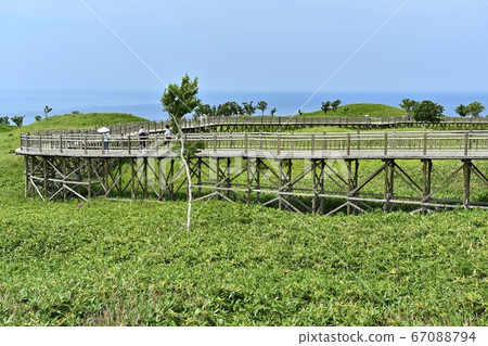 Sea of Okhotsk on the elevated wooden path to Shiretoko Lake 67088794