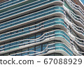 Urban background. Blue balconies and windows. 67088929