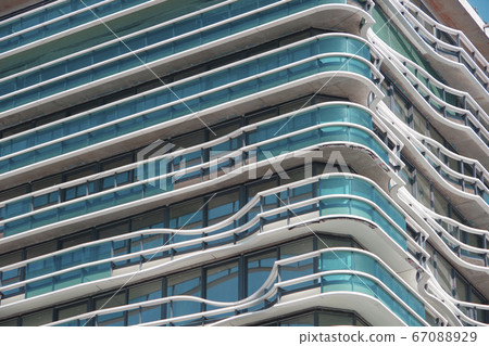 Urban background. Blue balconies and windows. Urban background. Blue balconies and windows. 67088929
