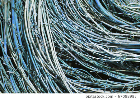Background of blue vines. Thin curved branches. 67088985
