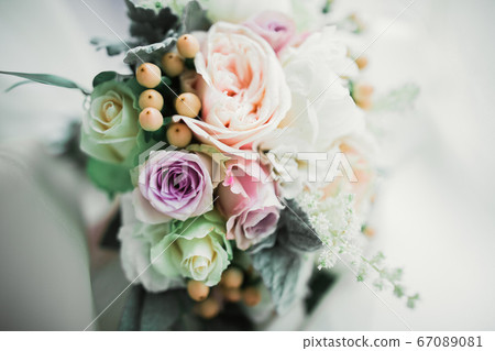 Wonderful luxury wedding bouquet of different flowers Wonderful luxury wedding bouquet of different flowers 67089081