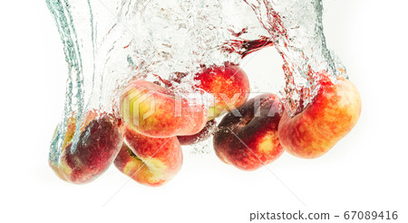 Bunch of doughnut peaches isolated on white, 67089416