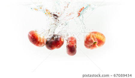 Bunch of doughnut peaches isolated on white, Bunch of doughnut peaches isolated on white, 67089434