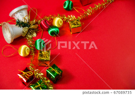 group of bell, ball and gift in christmas on red 67089735