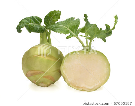 Fresh kohlrabi with green leaves isolated on white backround 67090197