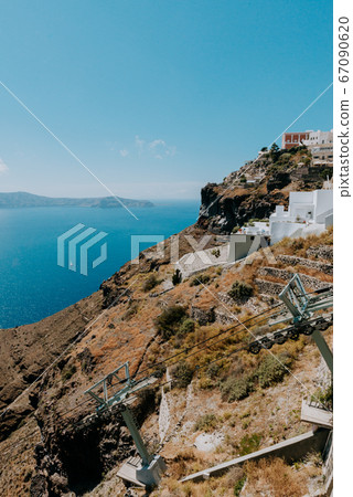 Oia Santorini Greece famous with romantic and beautiful sunsets. Oia village in Santorini island.Greece. 67090620