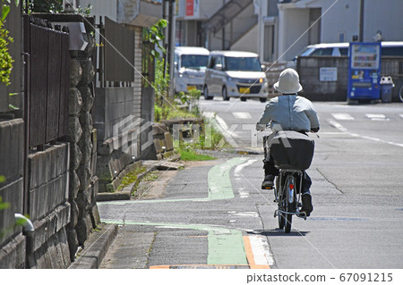 Senior riding a bicycle Senior riding a bicycle 67091215