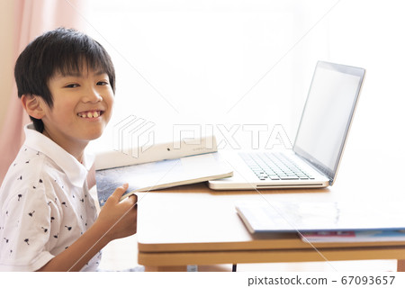 Boy studying online Boy studying online 67093657