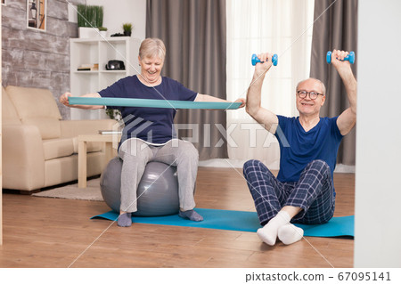 Senior couple exercising 67095141