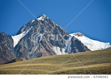 Mountain, cliffs, glaciers and snowfields in the Tien Shan Mountain, cliffs, glaciers and snowfields in the Tien Shan 67096981
