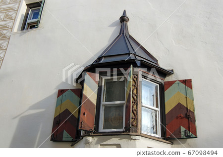 Ancient balcony with wooden windows - Guarda village Engadine Switzerland Ancient balcony with wooden windows - Guarda village Engadine Switzerland 67098494