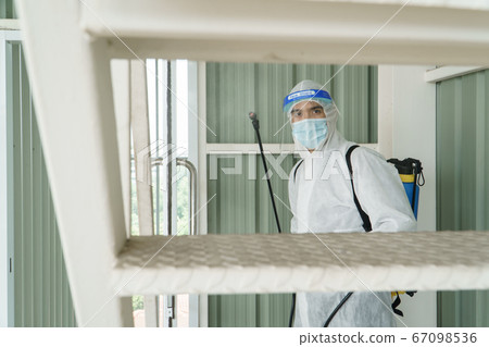 Public health workers are spraying disinfectants 67098536
