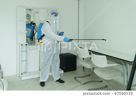 Public health workers are spraying disinfectants 67098539