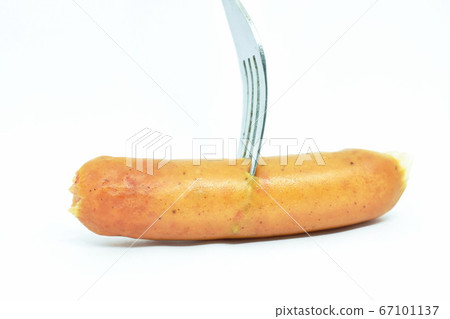 fried pork sausage stabbing by silver fork on white background fried pork sausage stabbing by silver fork on white background 67101137