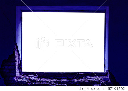 Rectangular frame, window opening in an old brick house. Blue backlight from the screen. Layout with Rectangular frame, window opening in an old brick house. Blue backlight from the screen. Layout with 67101502