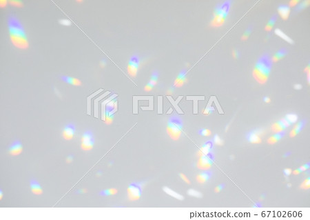 diagonal shadow and rays of light on a white wall 67102606
