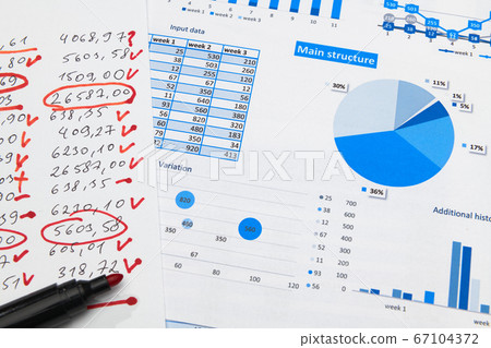 business office desk closeup - financial reports, 67104372