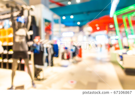 Abstract blur shopping mall in department store Abstract blur shopping mall in department store 67106867