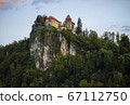 Beautiful view to the Castle of Bled. Bled Castle is a medieval castle built on precipice above the city of Bled in northwestern Slovenia 67112750