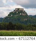 View to the medieval Castle Hochosterwitz in Carinthia, Austria. The castle belongs to the landmarks of Carinthia and located on top of a hill near Sankt Georgen am Langsee. 67112764