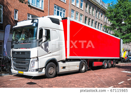 Front View of Semi-Truck with Red Cargo Trailer 67115985