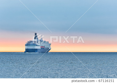 Big cruise ship in the sea at sunset. Beautiful 67116151