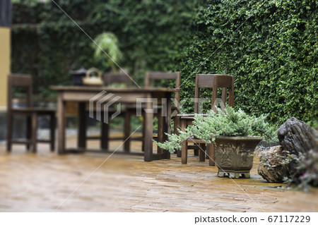 Blur background of outdoors garden furniture set Blur background of outdoors garden furniture set 67117229