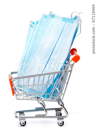 small shopping cart full medical mask isolated on a white background with clipping path 67118404