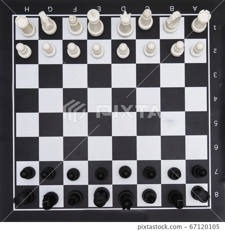 Chessboard with figures, black and white cells, background, texture. Chessboard with figures, black and white cells, background, texture. 67120105