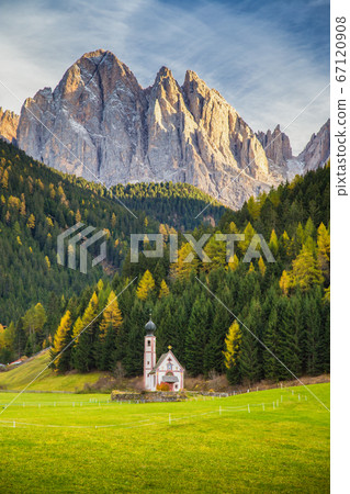 Church of St. Johann of Nepomuk with Odle Group in Dolomites at sunset, South Tyrol, Italy Church of St. Johann of Nepomuk with Odle Group in Dolomites at sunset, South Tyrol, Italy 67120908