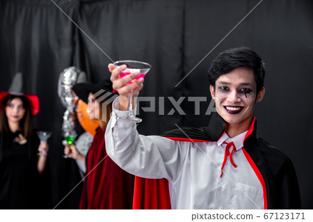 Portrait of asian man in halloween cloth Portrait of asian man in halloween cloth 67123171
