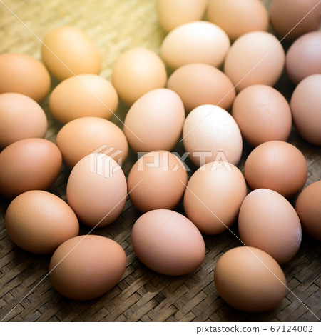Fresh farm eggs on a wooden background 67124002