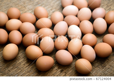 Fresh farm eggs on a wooden background 67124004