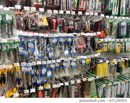 SEREMBAN, MALAYSIA -MAY 02, 2020: Hardware and carpentry tools hung and exhibited for sale in the shop. Sort by type and brand. Marked with the price tag. SEREMBAN, MALAYSIA -MAY 02, 2020: Hardware and carpentry tools hung and exhibited for sale in the shop. Sort by type and brand. Marked with the price tag. 67126003