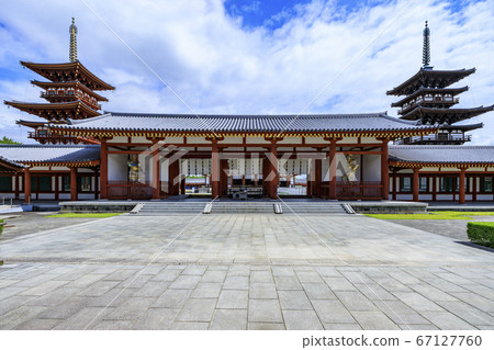 Lotus flower blooming at World Heritage Yakushiji Temple after the restoration of the east tower 67127760