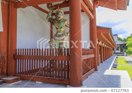 Lotus flower blooming at World Heritage Yakushiji Temple after the restoration of the east tower 67127763
