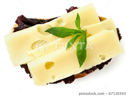 Sandwich with cheese and salad on a white Sandwich with cheese and salad on a white 67130393
