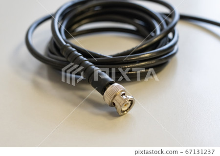 coaxial tv cable is wound into a skein close-up on 67131237