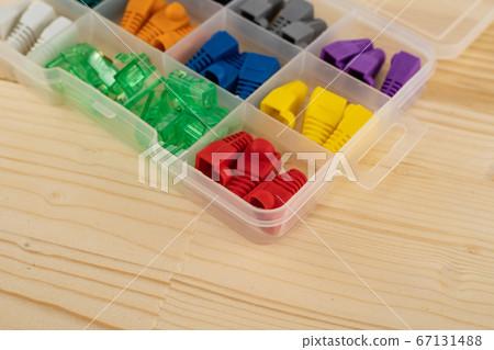 box with multi-colored caps of nozzles for wires 67131488