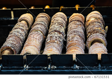 cooking Trdelnik european traditional dessert at 67131531
