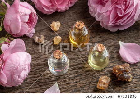 Bottles of essential oil with frankincense and 67131836