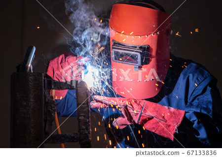 Metal welding steel works using electric arc welding machine 67133836