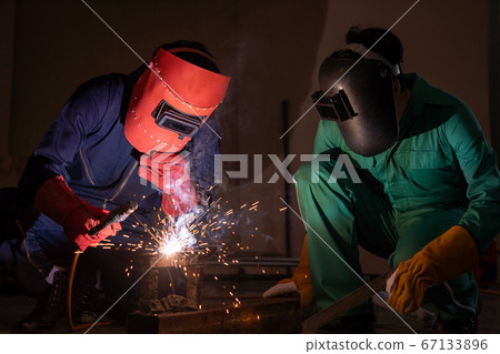 Metal welding steel works using electric arc welding machine Metal welding steel works using electric arc welding machine 67133896