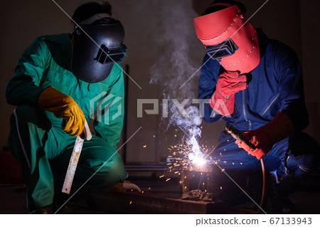 Metal welding steel works using electric arc welding machine Metal welding steel works using electric arc welding machine 67133943