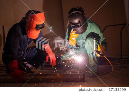 Metal welding steel works using electric arc welding machine Metal welding steel works using electric arc welding machine 67133999