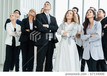 Successful business people standing together 67134000