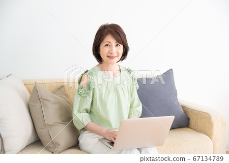 Senior woman stay home Senior woman stay home 67134789