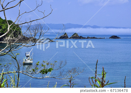 Michinoku Shiokaze Trail Shizugawa Bay Sea fog fluttering at the tip of the reef at Kotohama, Minamisanriku Town 67136478