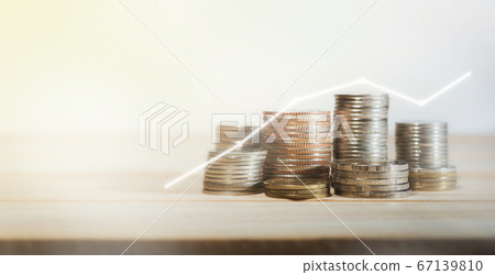 Coins on wooden table business concept Coins on wooden table business concept 67139810