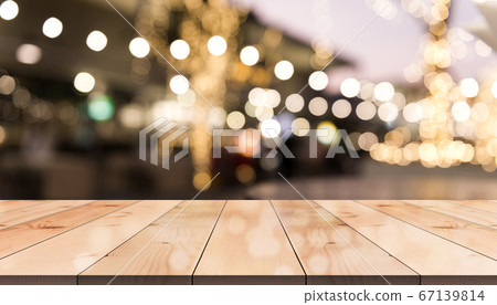 Empty wooden table top with lights bokeh on blur Empty wooden table top with lights bokeh on blur 67139814
